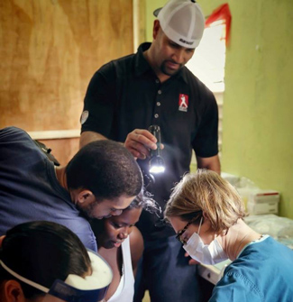 Pediatric Dentist Dr. Sarah Smith and Albert Pujols
